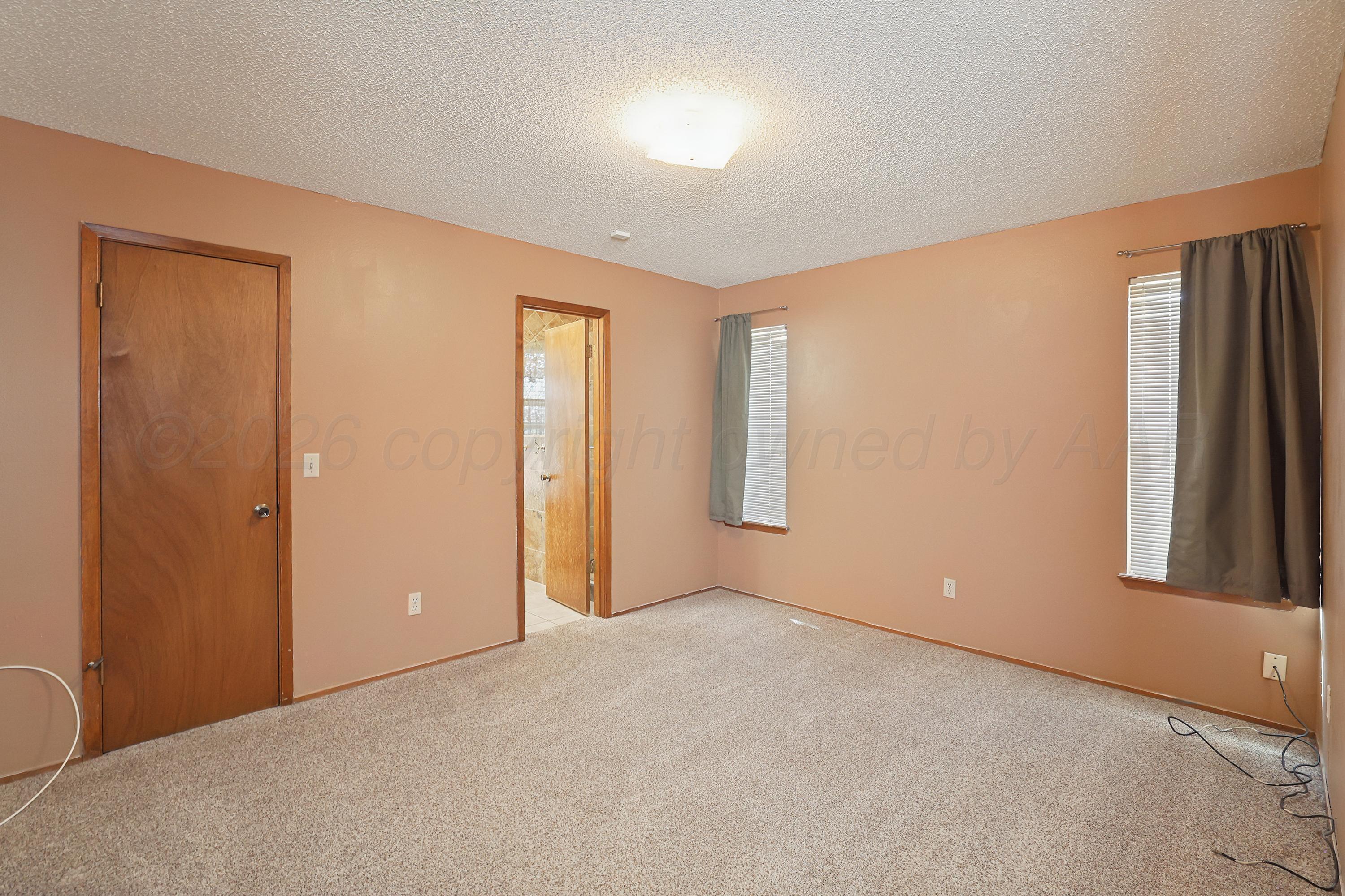 5102 Raindrop Lane Amarillo, TX 79110 - Photo 11 of 28 12-Primary Bedroom