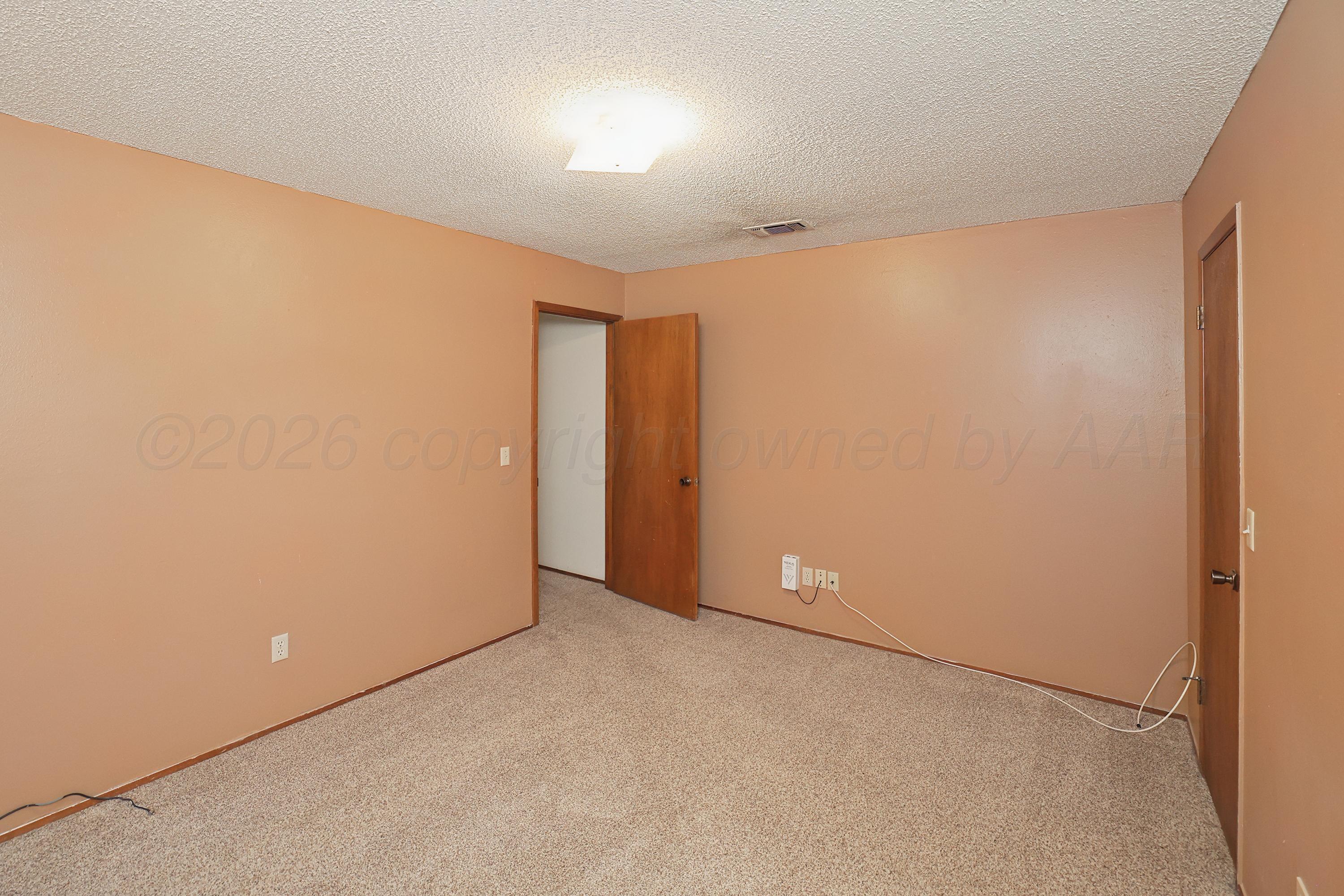 5102 Raindrop Lane Amarillo, TX 79110 - Photo 12 of 28 13-Primary Bedroom