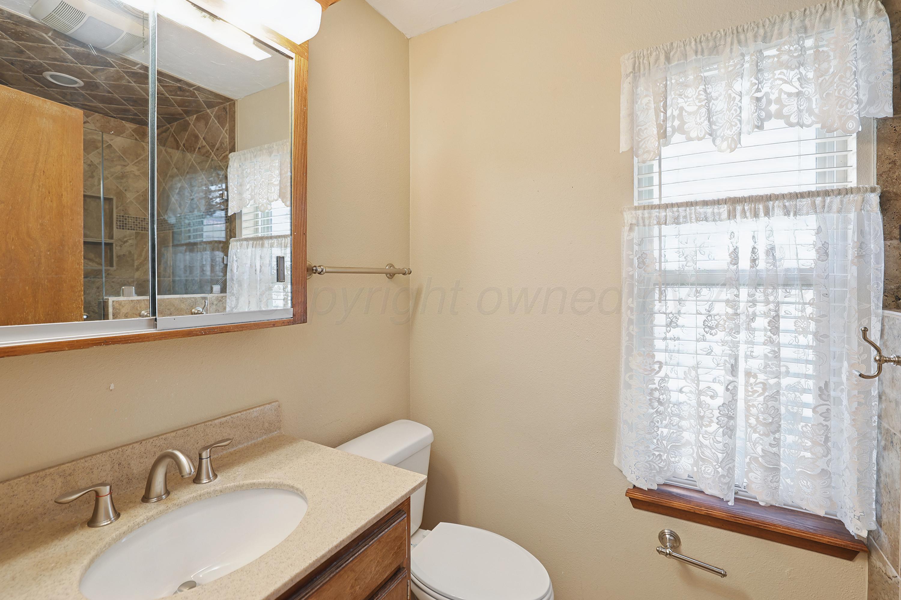 5102 Raindrop Lane Amarillo, TX 79110 - Photo 13 of 28 14-Primary Bath