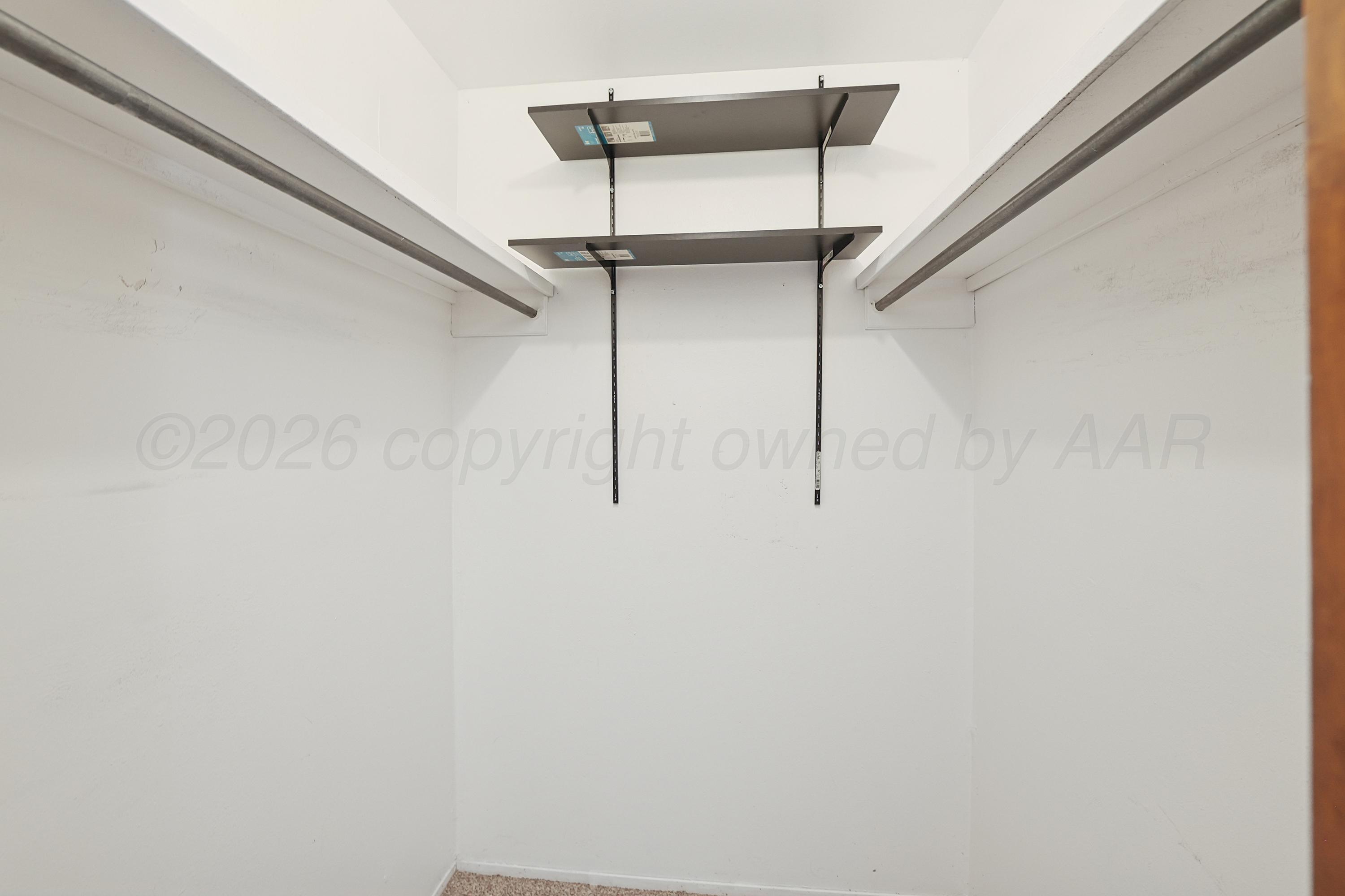 5102 Raindrop Lane Amarillo, TX 79110 - Photo 15 of 28 16-Primary Closet