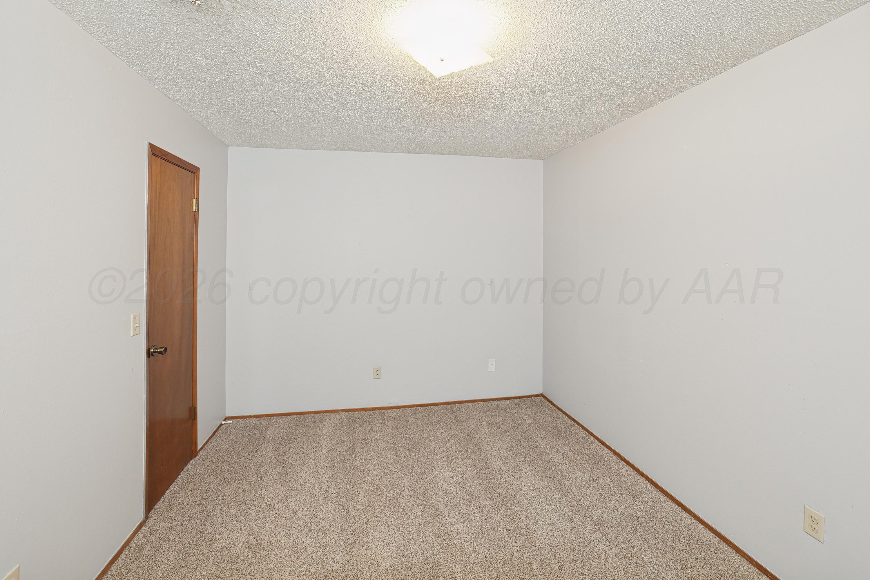 5102 Raindrop Lane Amarillo, TX 79110 - Photo 19 of 28 20-3rd Bedroom