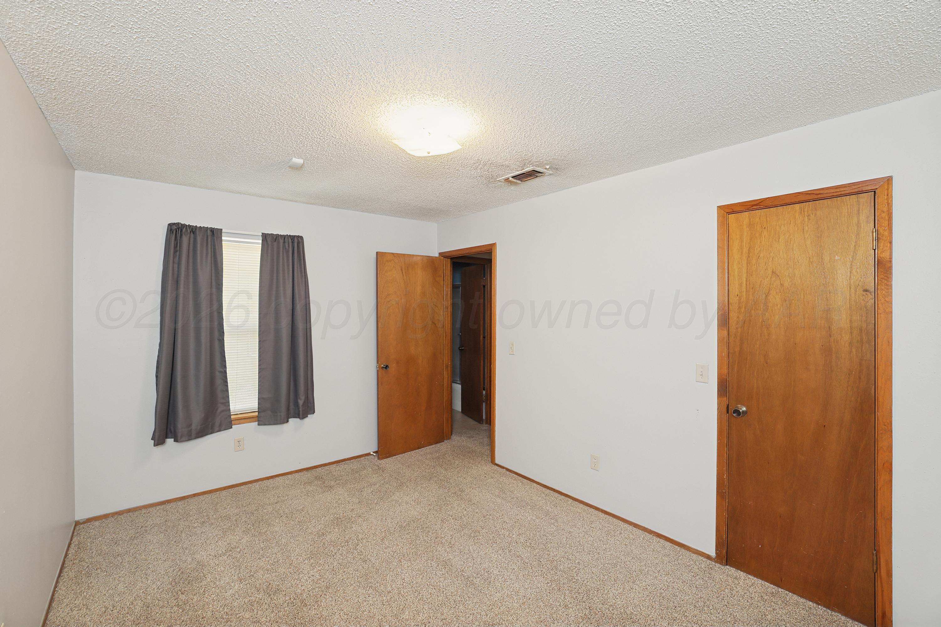 5102 Raindrop Lane Amarillo, TX 79110 - Photo 20 of 28 21-3rd Bedroom