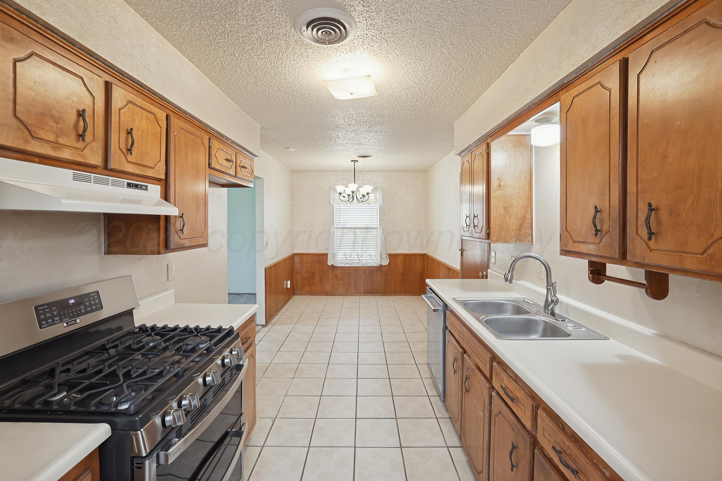 5102 Raindrop Lane Amarillo, TX 79110 - Photo 7 of 28 8-Kitchen & Dining
