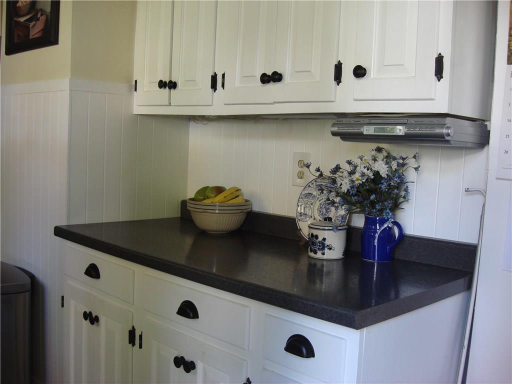 123 Winthrop Street Augusta, ME 04330 - Photo 22 of 35 Kitchen counter-tops and cabinetry.
