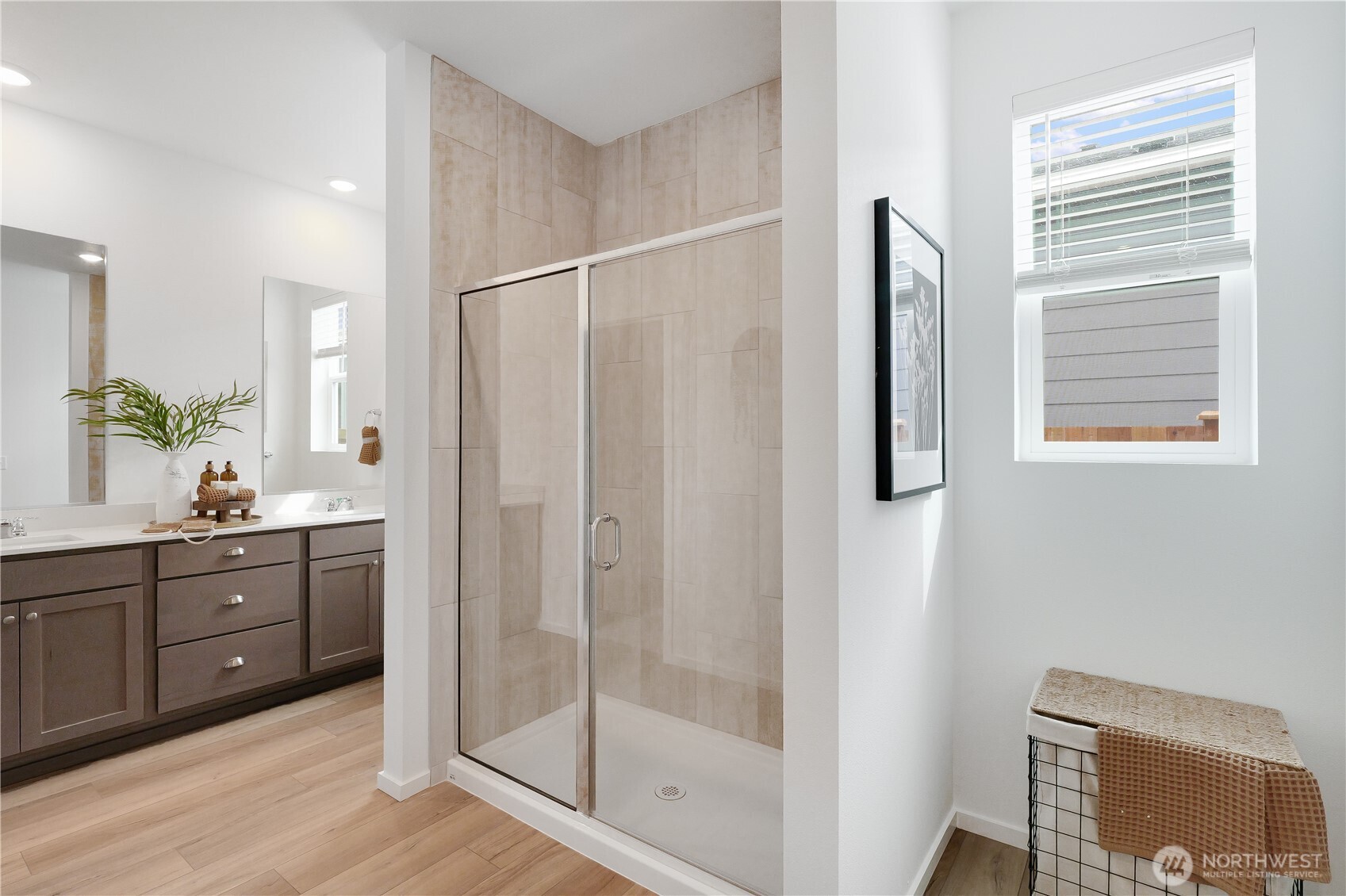 72 Moonshadow Lane Sequim, WA 98382 - Photo 15 of 27 a spacious bathroom with a shower sink and mirror