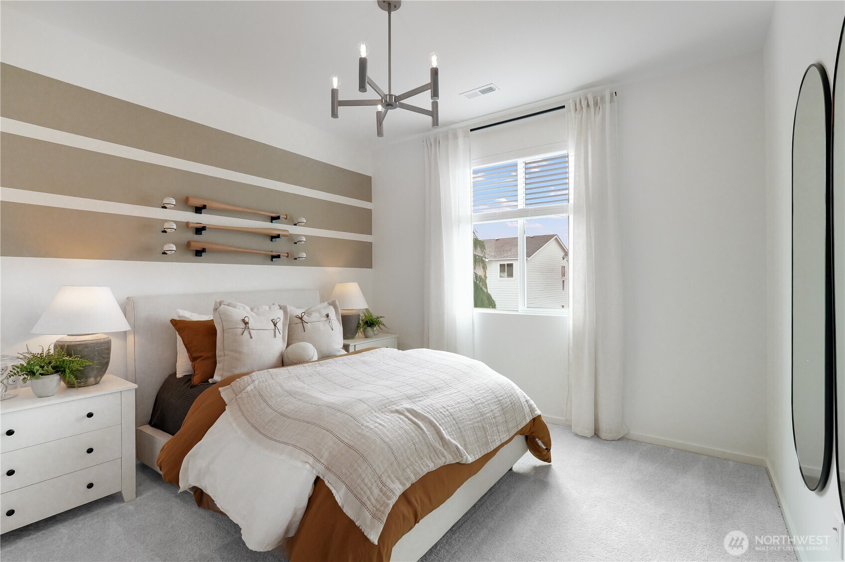 72 Moonshadow Lane Sequim, WA 98382 - Photo 20 of 27 a bedroom with a bed and window