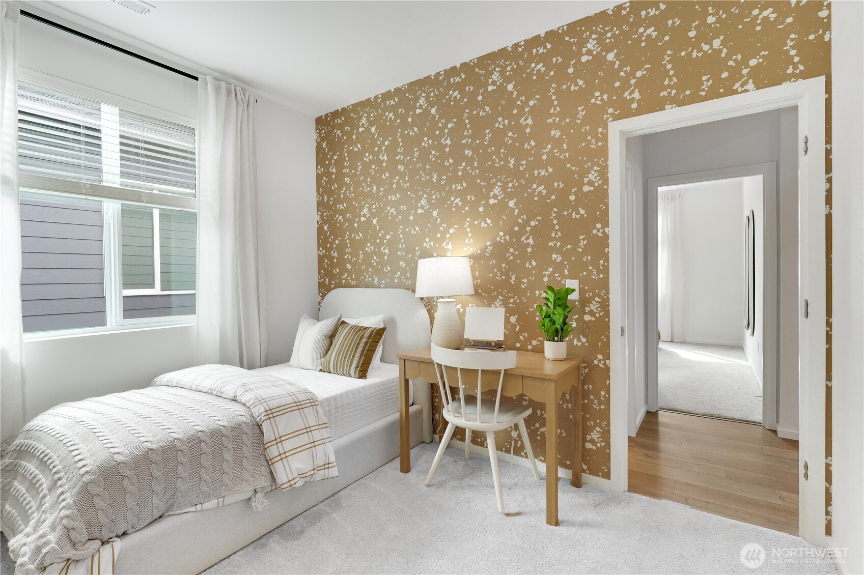 72 Moonshadow Lane Sequim, WA 98382 - Photo 23 of 27 a bedroom with a bed and a table lamp