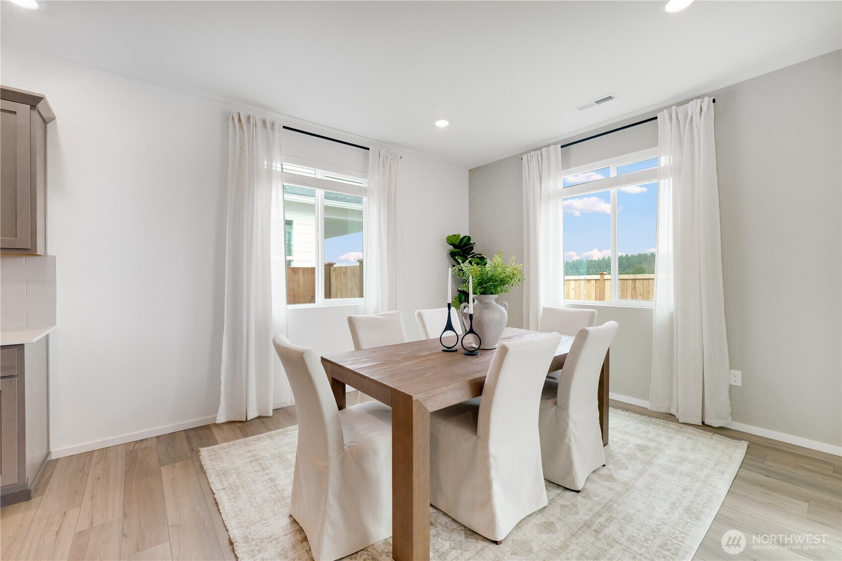 72 Moonshadow Lane Sequim, WA 98382 - Photo 9 of 27 a view of a dining room with furniture and window
