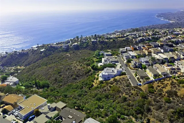 a view of a city with ocean view in back