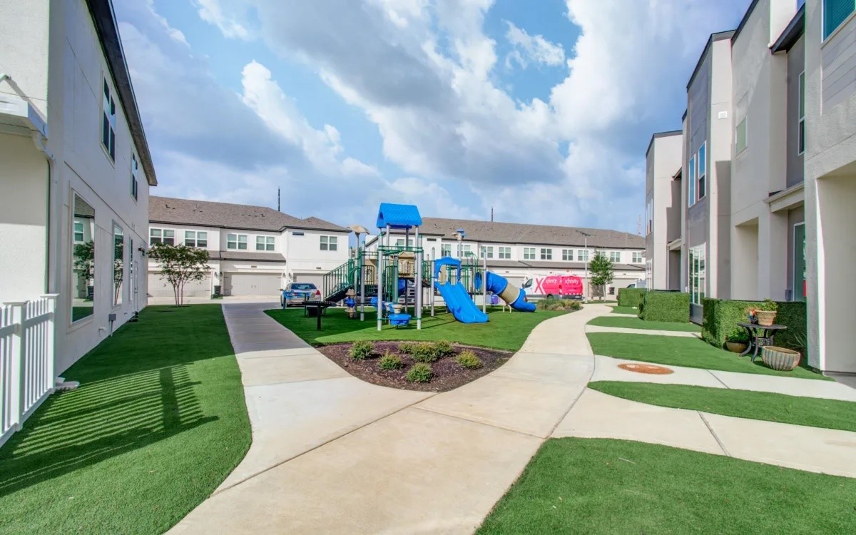 21455 Merchant's Way, Unit 103 Katy, TX 77449 - Photo 16 of 20 a view of park with large trees