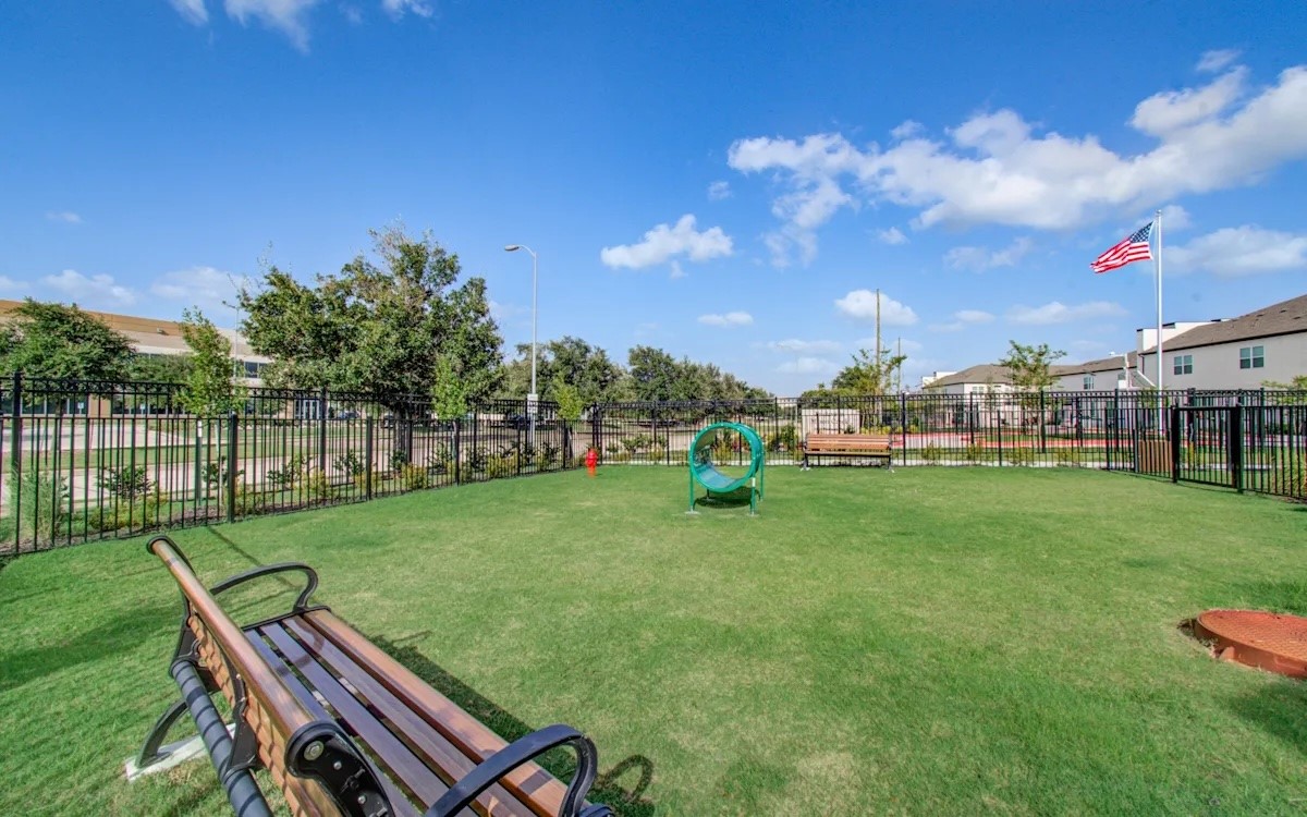 21455 Merchant's Way, Unit 103 Katy, TX 77449 - Photo 20 of 20 a view of a park with seating area