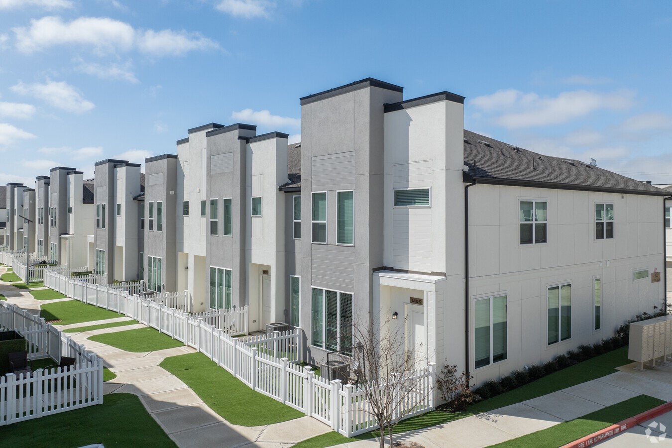 21455 Merchant's Way, Unit 103 Katy, TX 77449 - Photo 2 of 20 a view of a house with backyard and sitting area