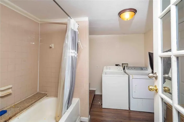 a utility room with dryer and washer