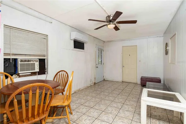 a bedroom with a bed and a table