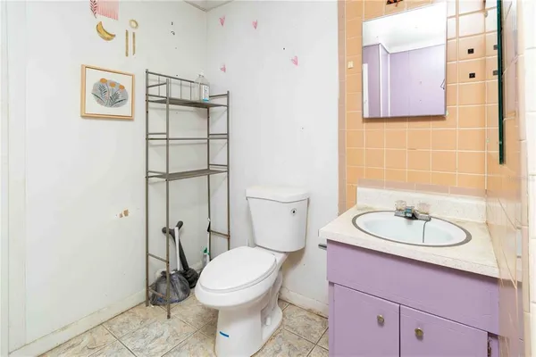 a room that has a couch and a chair in it