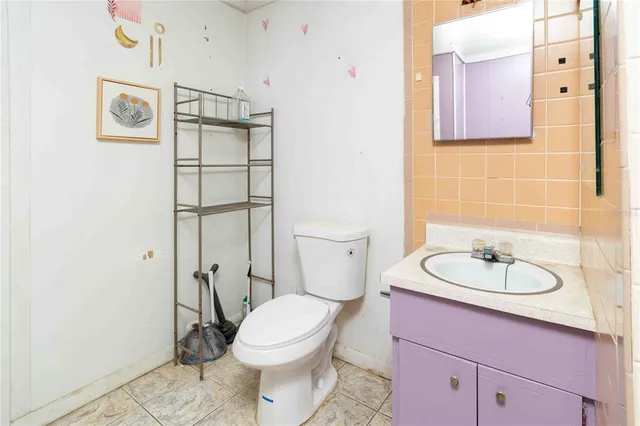 a room that has a couch and a chair in it