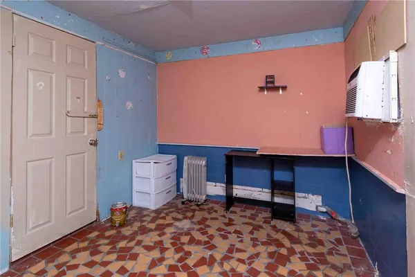 a view of a chairs and table in the patio