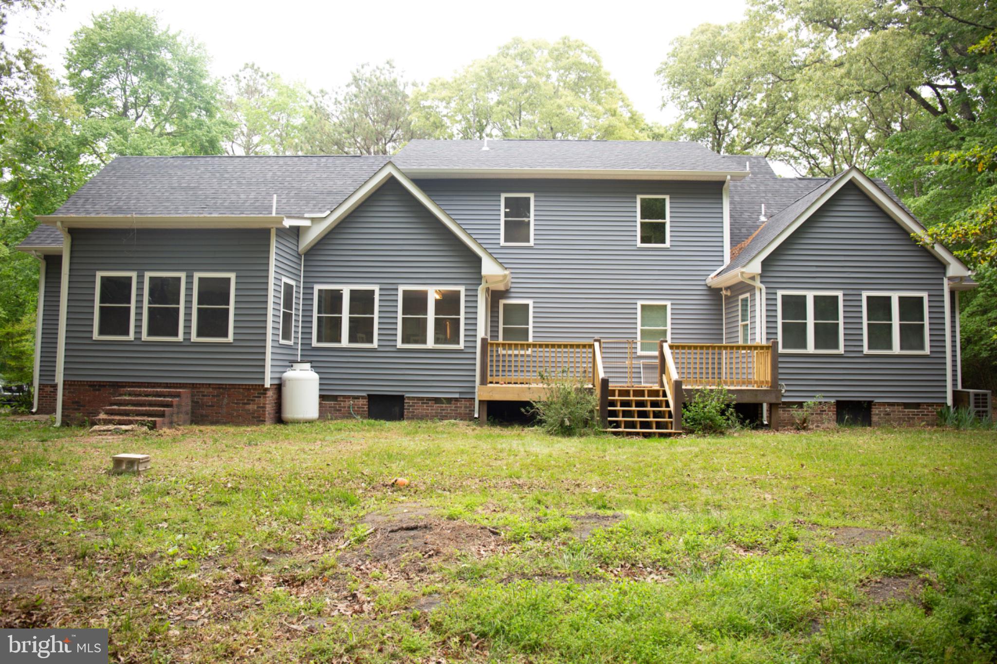 3824 Coulbourn Mill Road Salisbury, MD 21804 - Photo 8 of 60 Charming gray home with inviting deck.