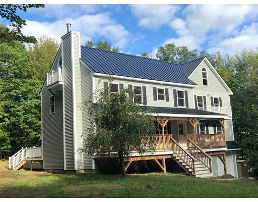 561 Black Brook Road Goffstown, NH 03045 - Photo 1 of 36 a front view of house with a garden