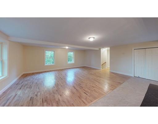 561 Black Brook Road Goffstown, NH 03045 - Photo 12 of 36 a open hall with wooden floor