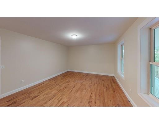 561 Black Brook Road Goffstown, NH 03045 - Photo 20 of 36 a open kitchen with a sink and wooden floor