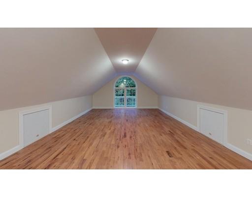 561 Black Brook Road Goffstown, NH 03045 - Photo 29 of 36 a open kitchen with a white countertops and wooden floor