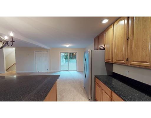 561 Black Brook Road Goffstown, NH 03045 - Photo 8 of 36 a open kitchen with a sink and cabinet