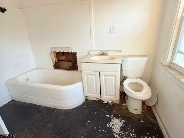 a bathroom with a sink and a toilet
