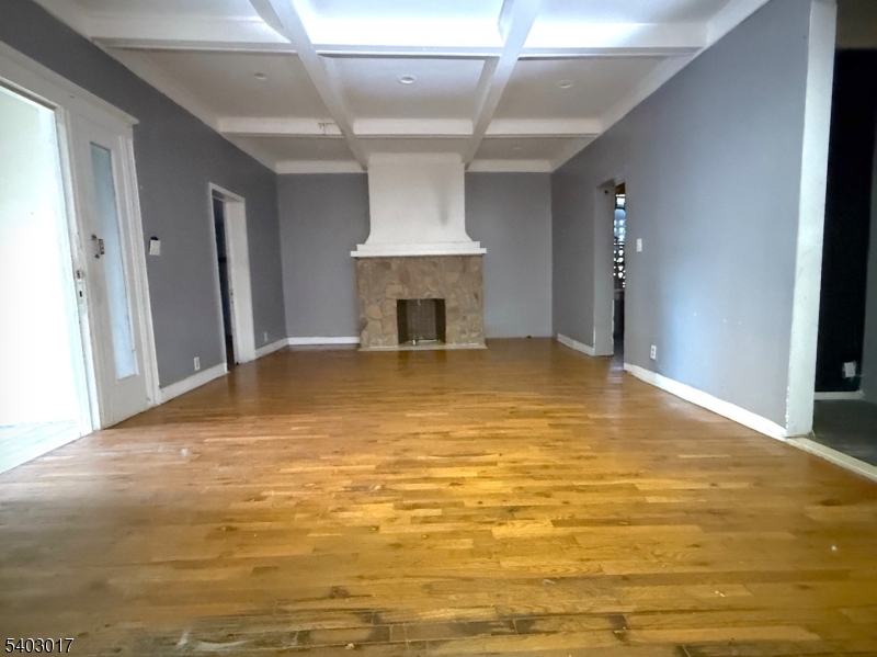66 Scheerer Avenue Newark, NJ 07112 - Photo 5 of 24 a view of a livingroom with a fireplace