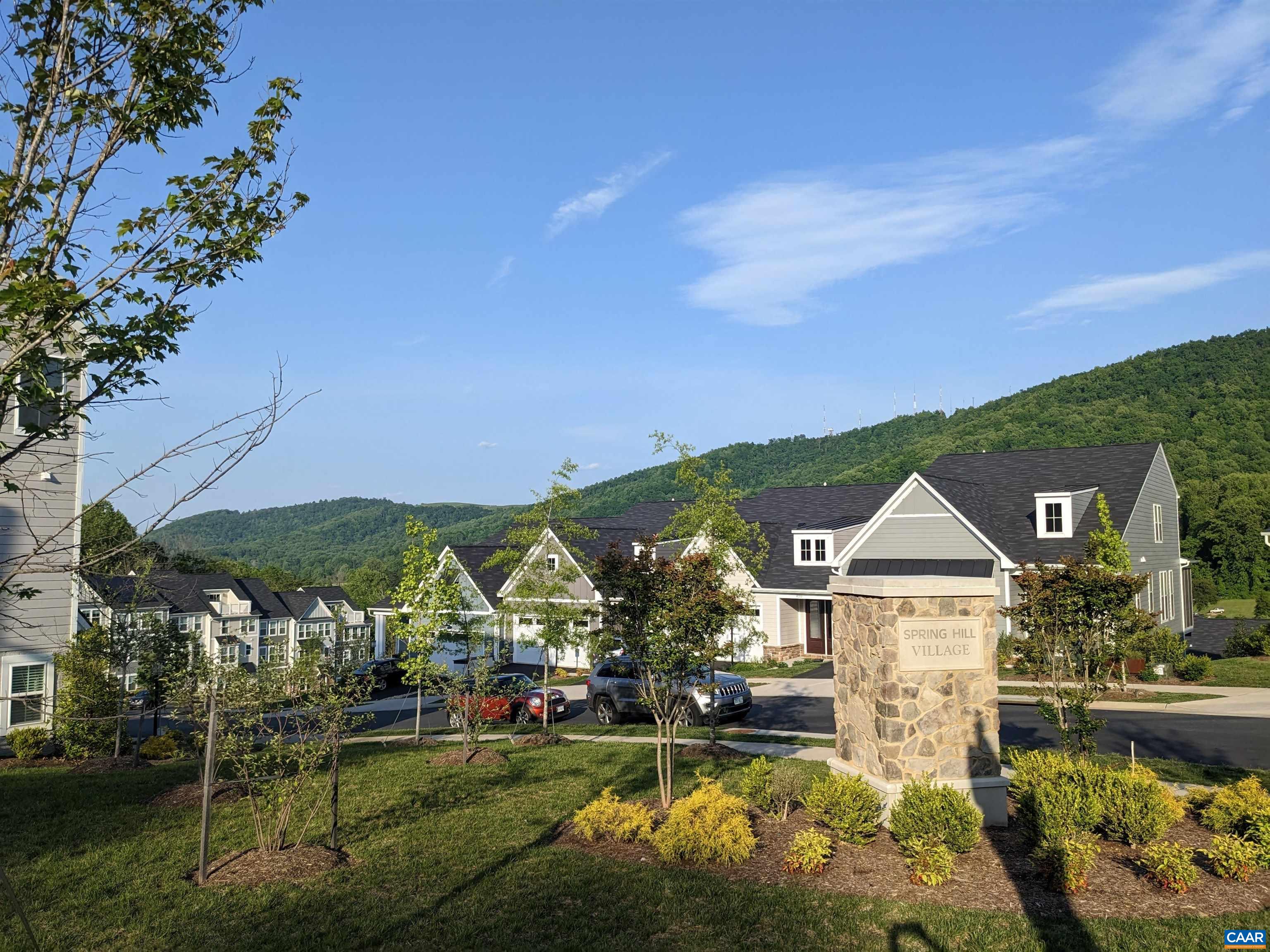 4758 Loyola Way Charlottesville, VA 22902 - Photo 1 of 26 a view of a town with mountains in the background