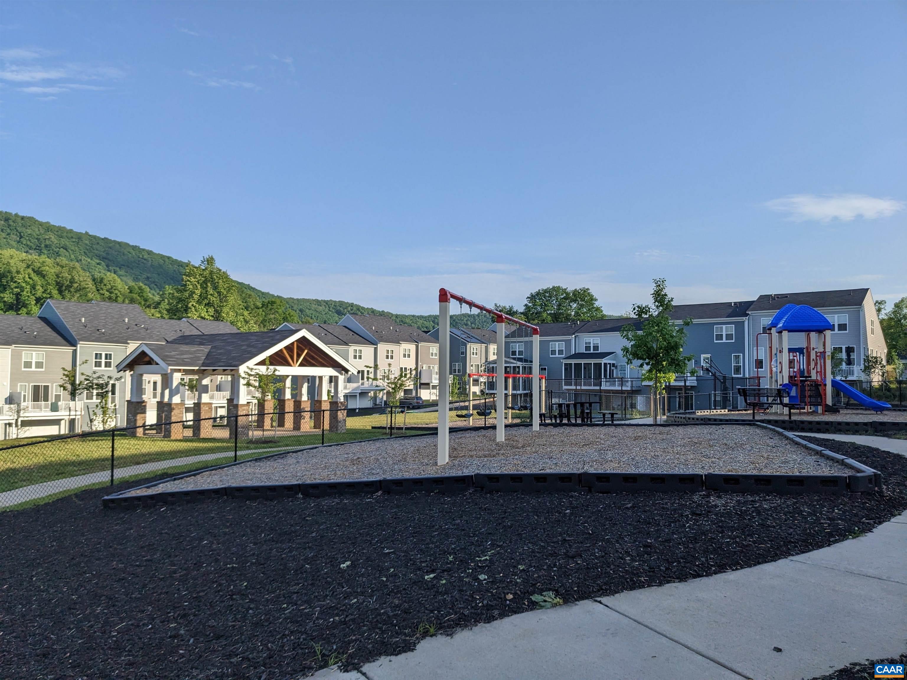4758 Loyola Way Charlottesville, VA 22902 - Photo 21 of 26 a front view of a house with a yard