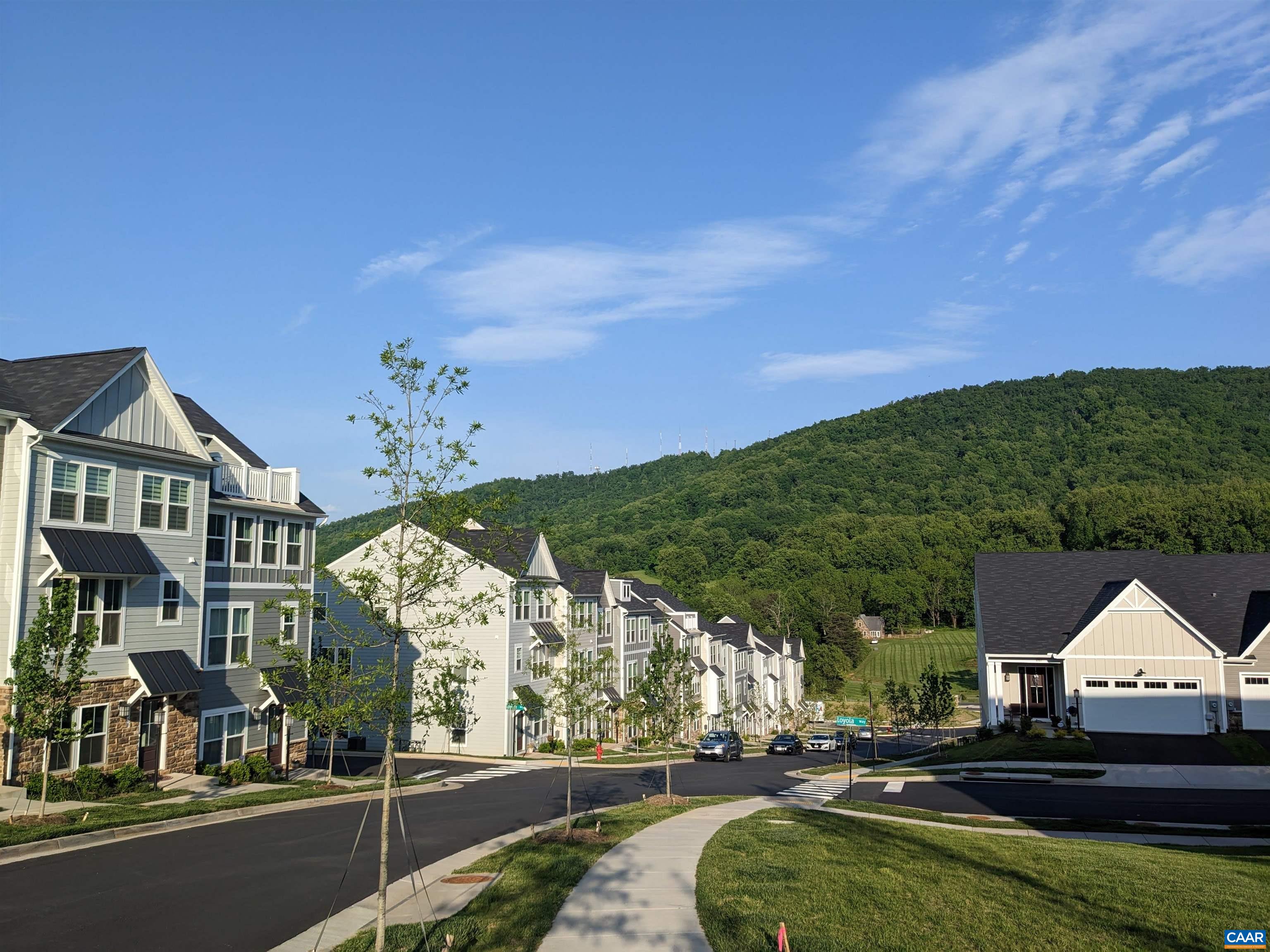 4758 Loyola Way Charlottesville, VA 22902 - Photo 23 of 26 a view of a house with a swimming pool
