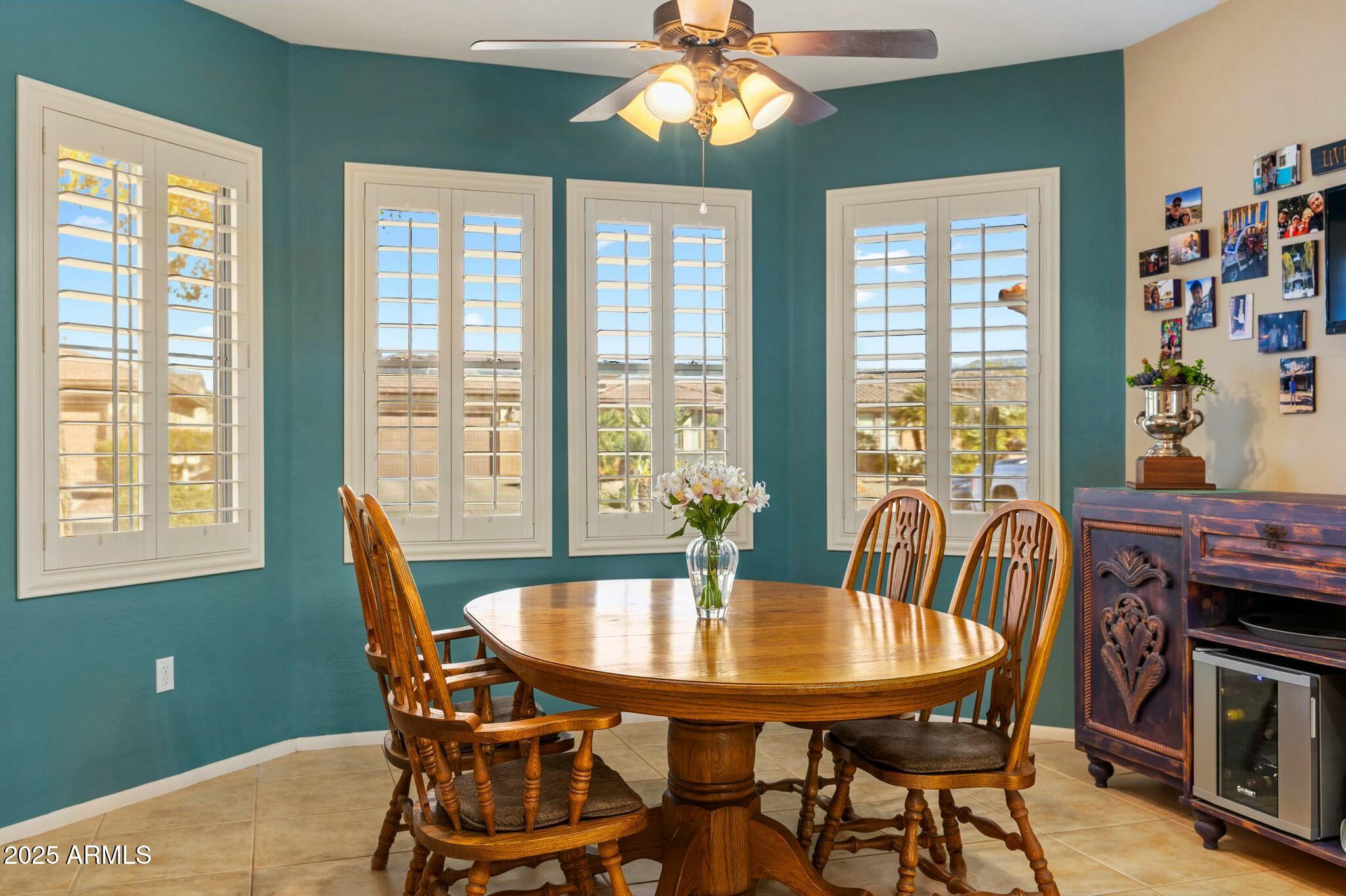 20139 North Rawhide Way Surprise, AZ 85387 - Photo 13 of 30 a dining room with furniture and window