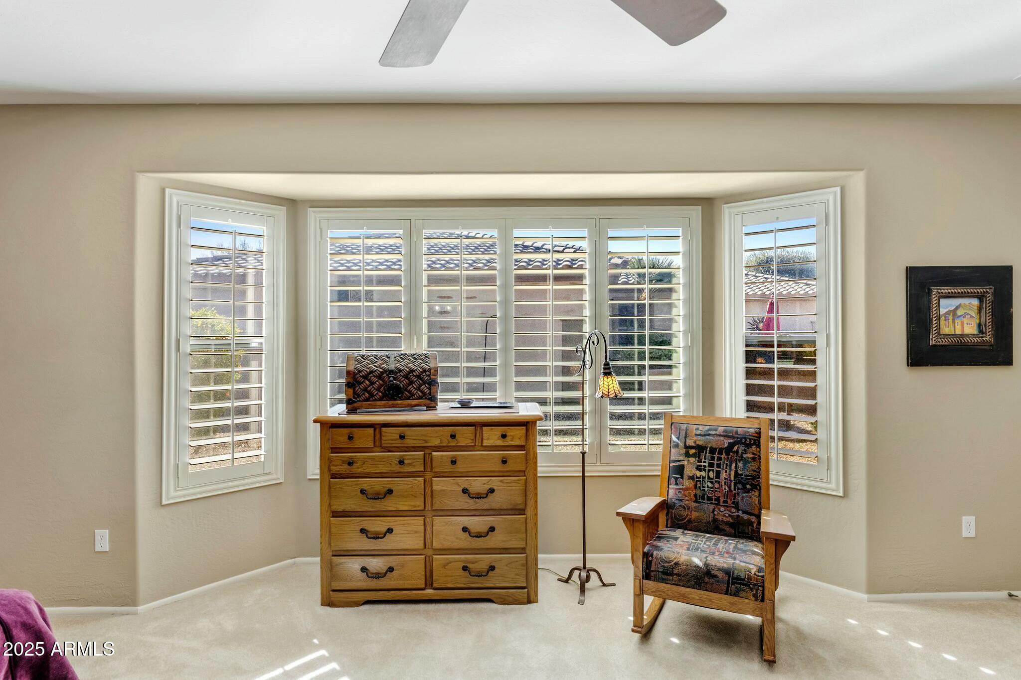 20139 North Rawhide Way Surprise, AZ 85387 - Photo 23 of 30 a living room with furniture and a window
