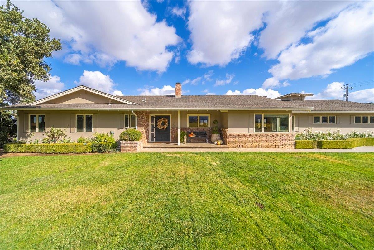 38280 Arroyo Seco Road Soledad, CA 93960 - Photo 1 of 41 a front view of a house with swimming pool having outdoor seating