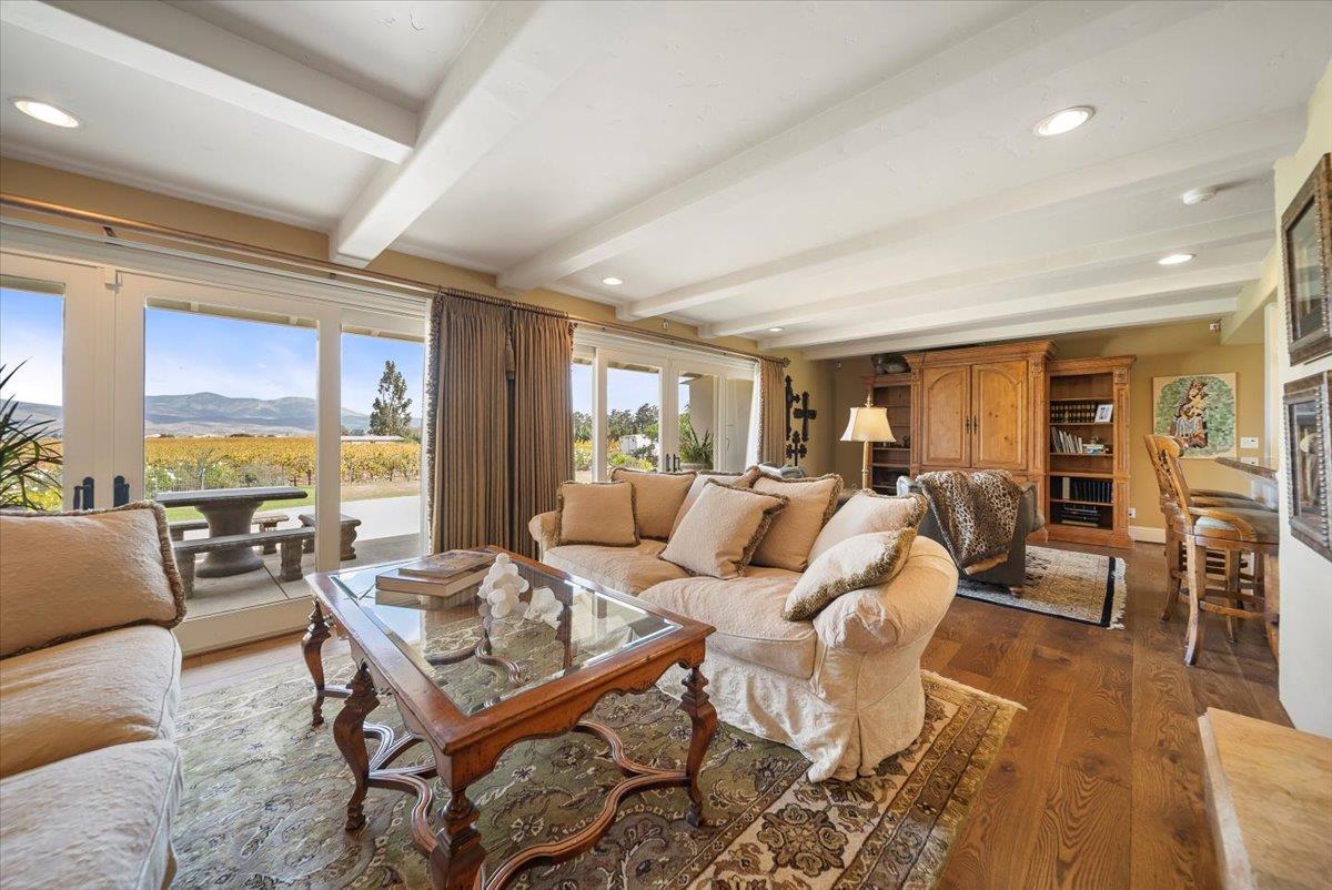 38280 Arroyo Seco Road Soledad, CA 93960 - Photo 14 of 41 a living room with furniture dining table and a large window