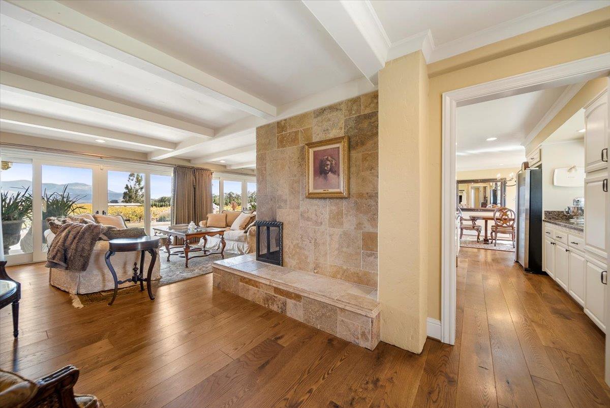 38280 Arroyo Seco Road Soledad, CA 93960 - Photo 17 of 41 a living room with lots of furniture wooden floor and a large window