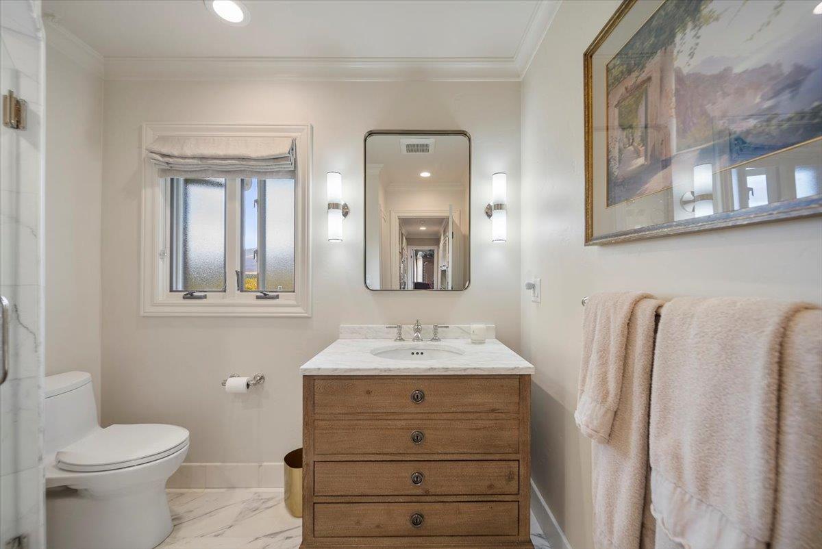 38280 Arroyo Seco Road Soledad, CA 93960 - Photo 20 of 41 a bathroom with a sink vanity mirror and toilet