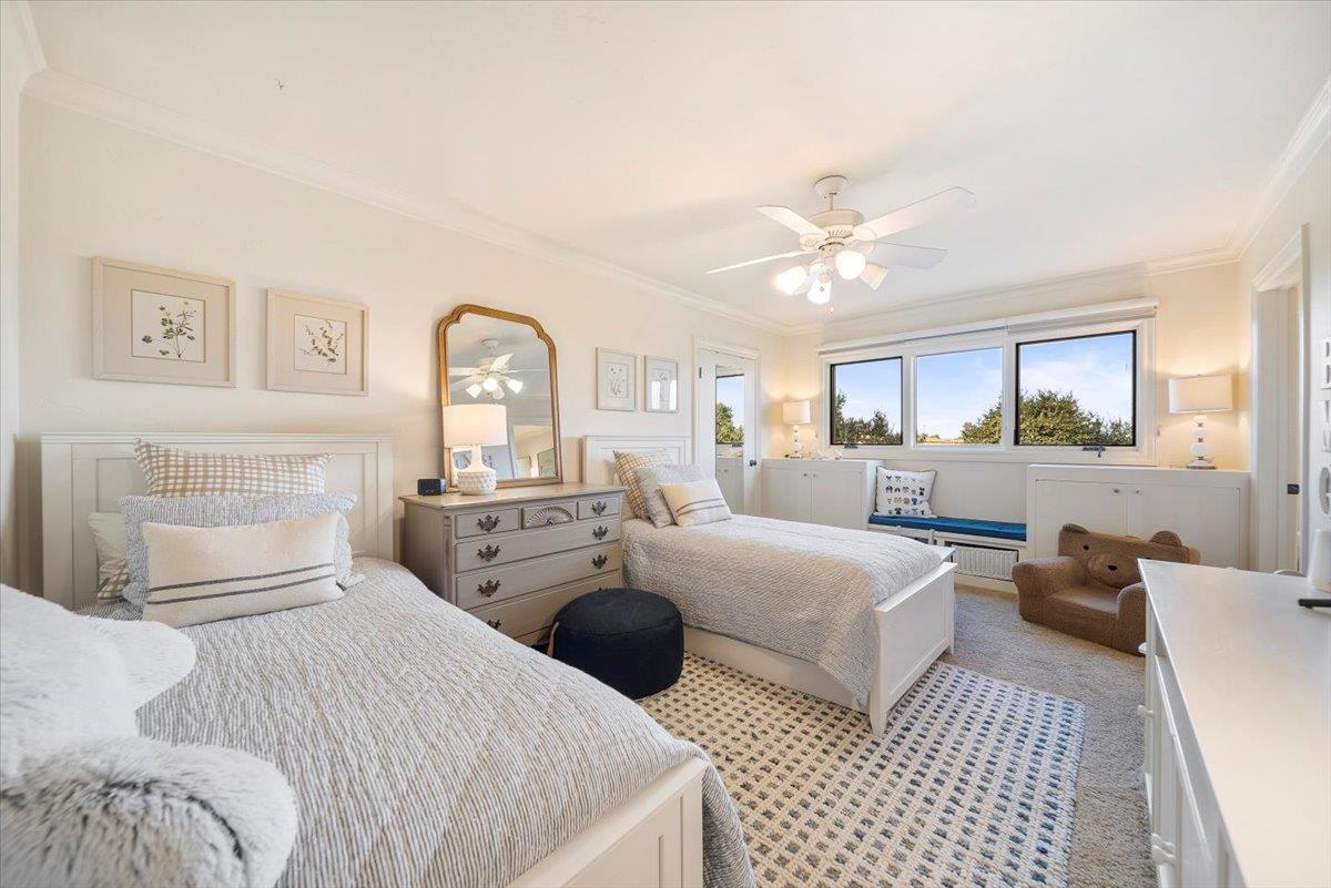 38280 Arroyo Seco Road Soledad, CA 93960 - Photo 23 of 41 a bedroom with a bed and a chandelier
