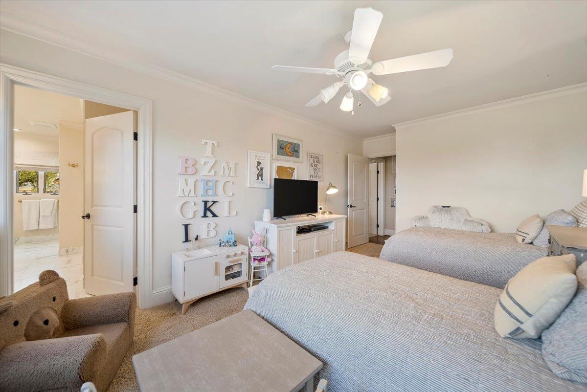 38280 Arroyo Seco Road Soledad, CA 93960 - Photo 24 of 41 a bedroom with a bed and a flat screen tv