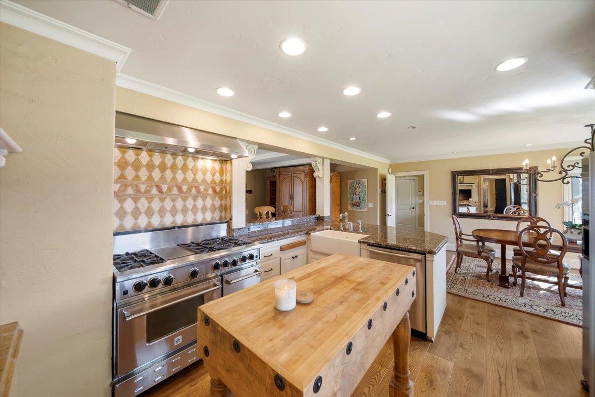 38280 Arroyo Seco Road Soledad, CA 93960 - Photo 5 of 41 a kitchen with stainless steel appliances granite countertop a stove and a refrigerator