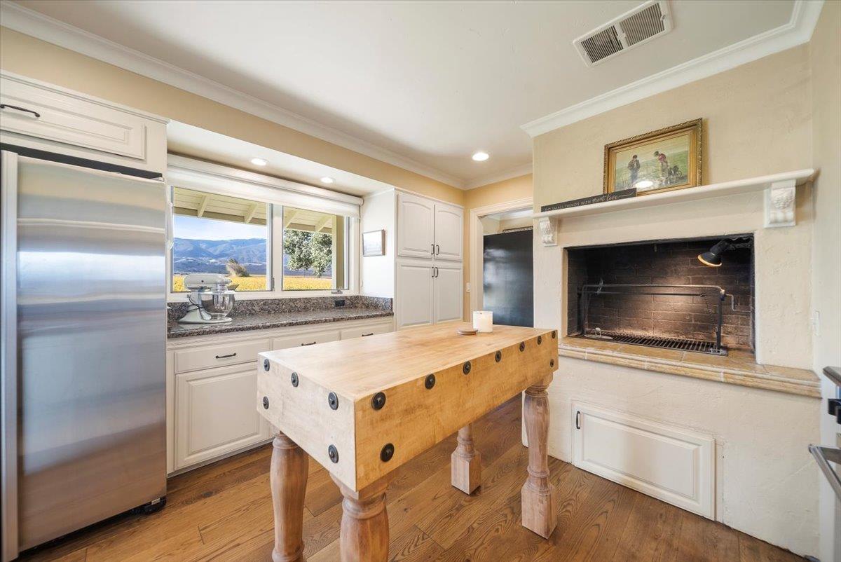 38280 Arroyo Seco Road Soledad, CA 93960 - Photo 7 of 41 a kitchen with stainless steel appliances a stove a sink and a refrigerator