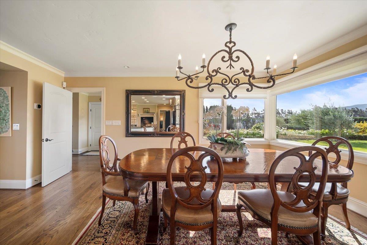 38280 Arroyo Seco Road Soledad, CA 93960 - Photo 8 of 41 a view of a dining room with furniture window and wooden floor