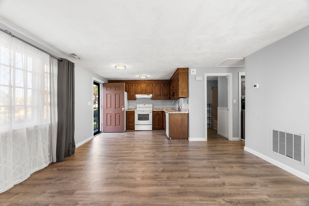 20 Washington Street, Unit 54 Methuen, MA 01844 - Photo 14 of 27 a view of kitchen with wooden floor