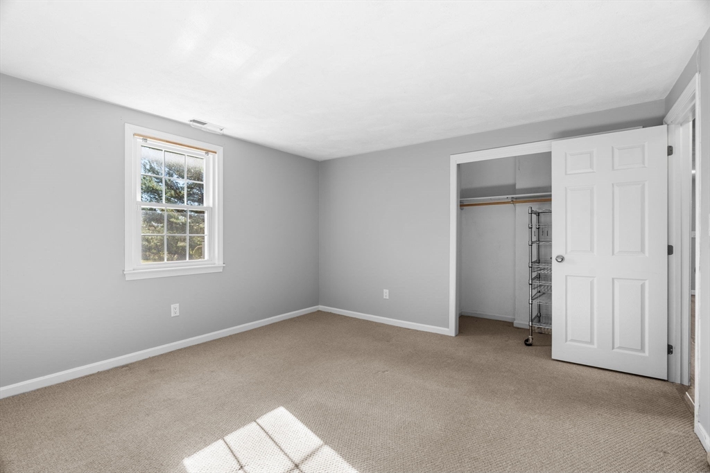 20 Washington Street, Unit 54 Methuen, MA 01844 - Photo 20 of 27 a view of an empty room with a window