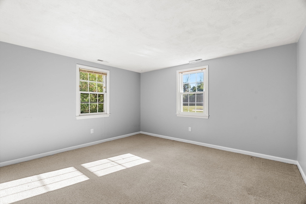 20 Washington Street, Unit 54 Methuen, MA 01844 - Photo 21 of 27 an empty room with windows
