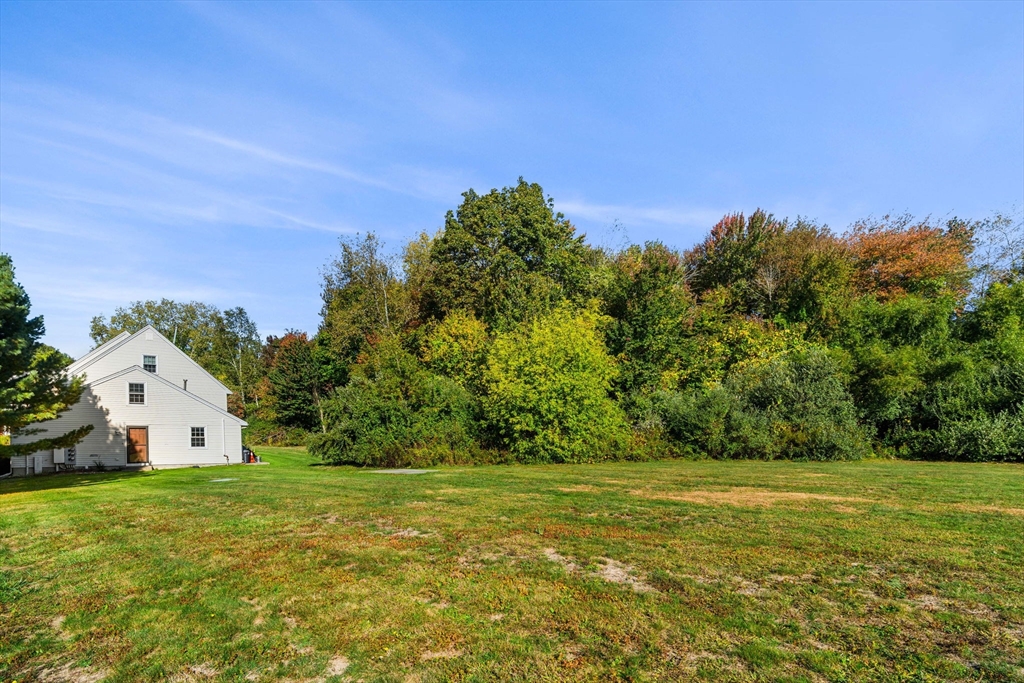 20 Washington Street, Unit 54 Methuen, MA 01844 - Photo 3 of 27 a view of a house with a yard