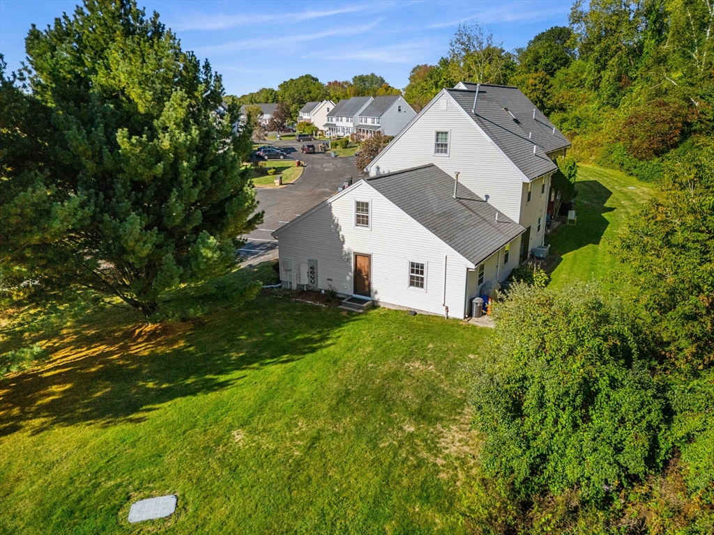 20 Washington Street, Unit 54 Methuen, MA 01844 - Photo 5 of 27 a view of a house with a yard