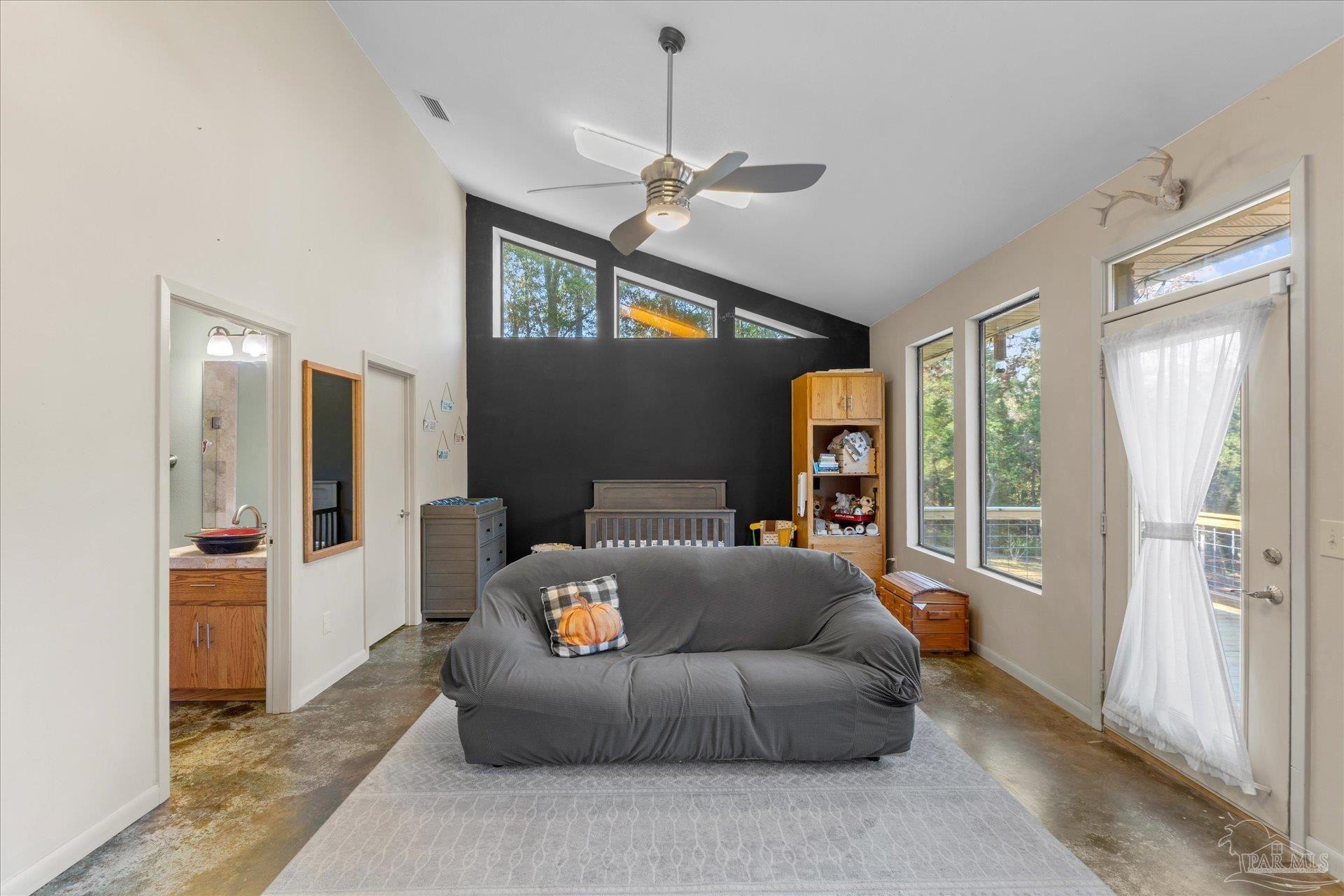 4394 Crabtree Church Road Molino, FL 32577 - Photo 23 of 70 a living room with furniture and a window