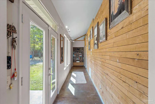 a view of a pathway of a house with a porch